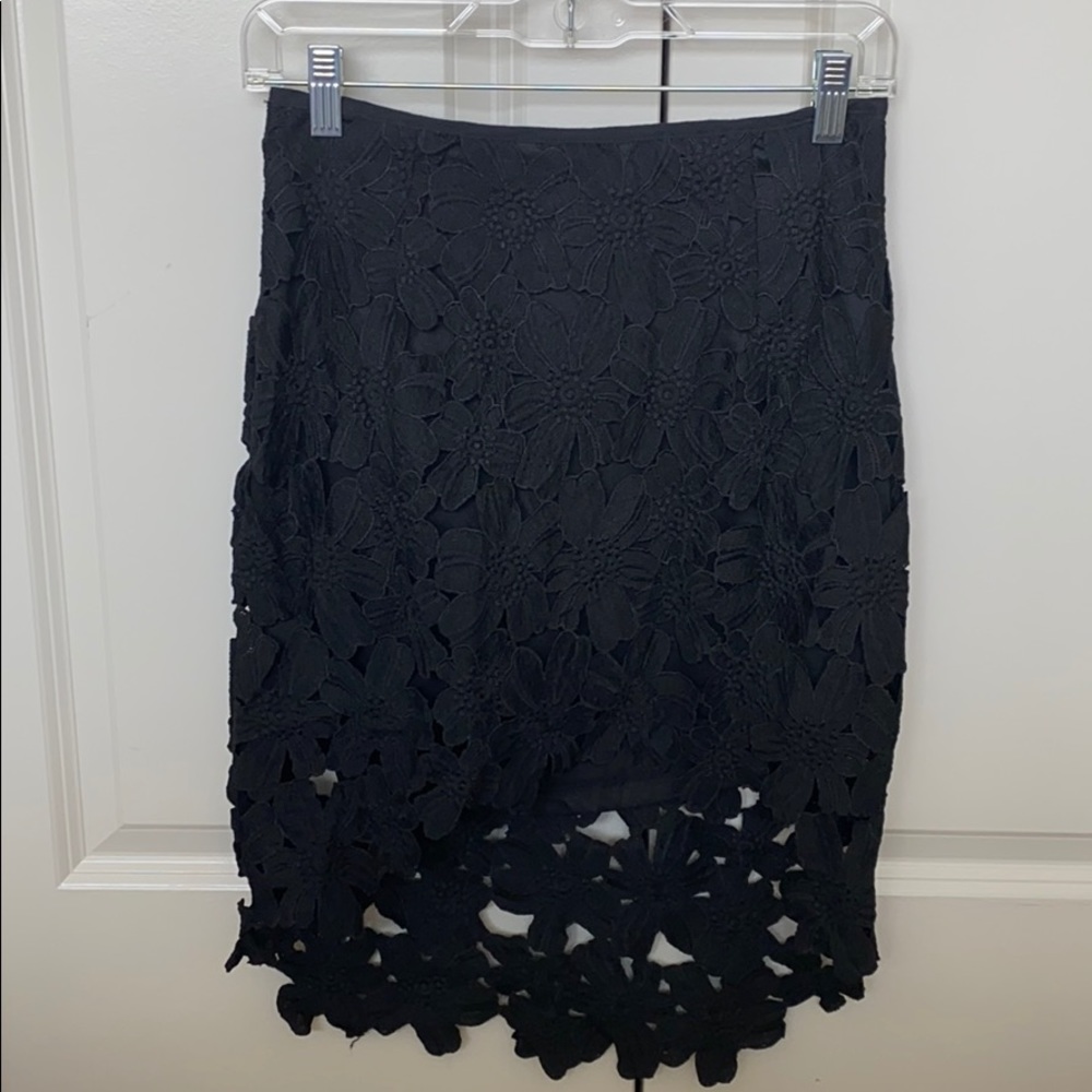 Black skirt with lace appliqué design